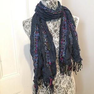 Blue tasseled knit scarf